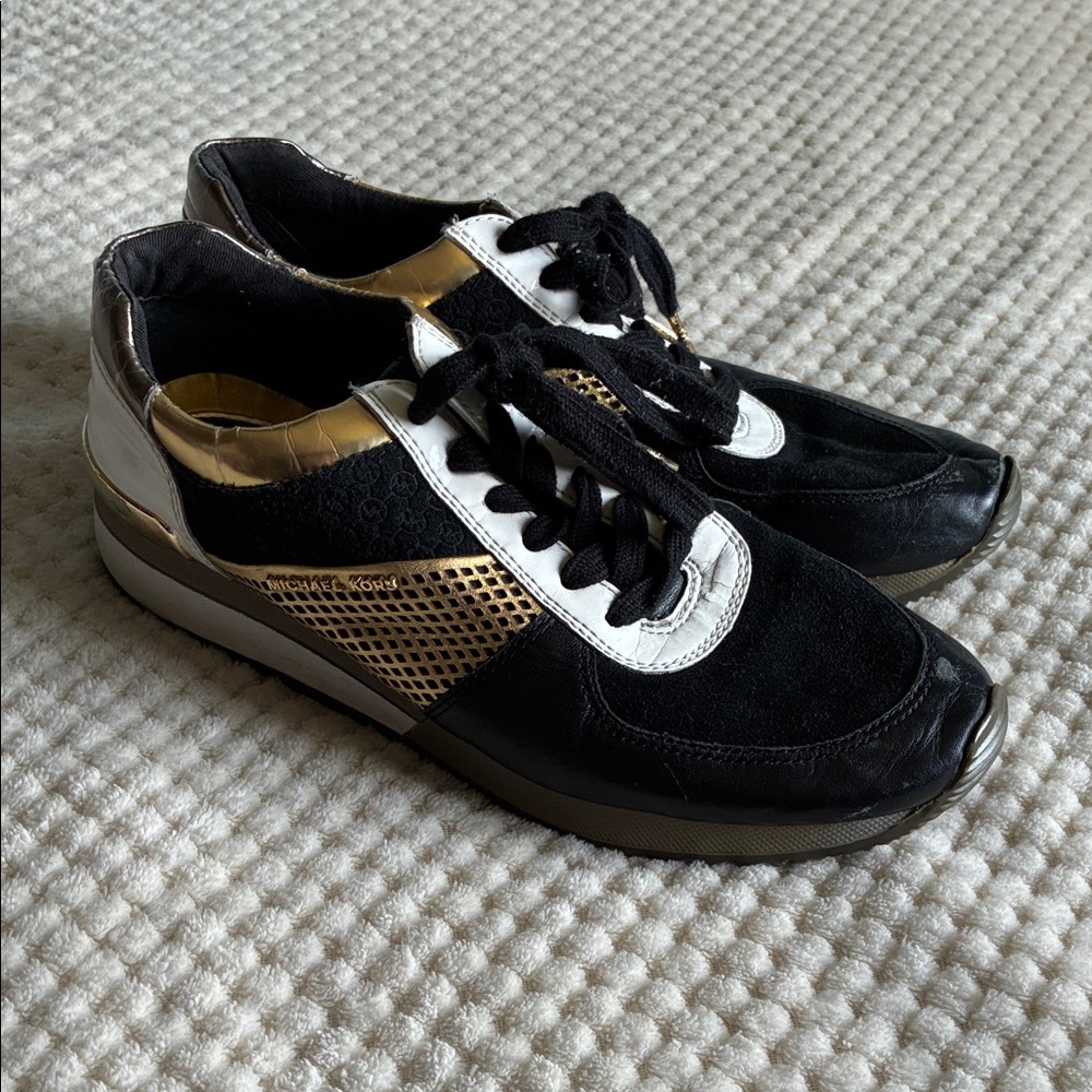 Michael Kors Black ,White and Gold Low-Top “Allie”Sneakers Used see pics. Size 9